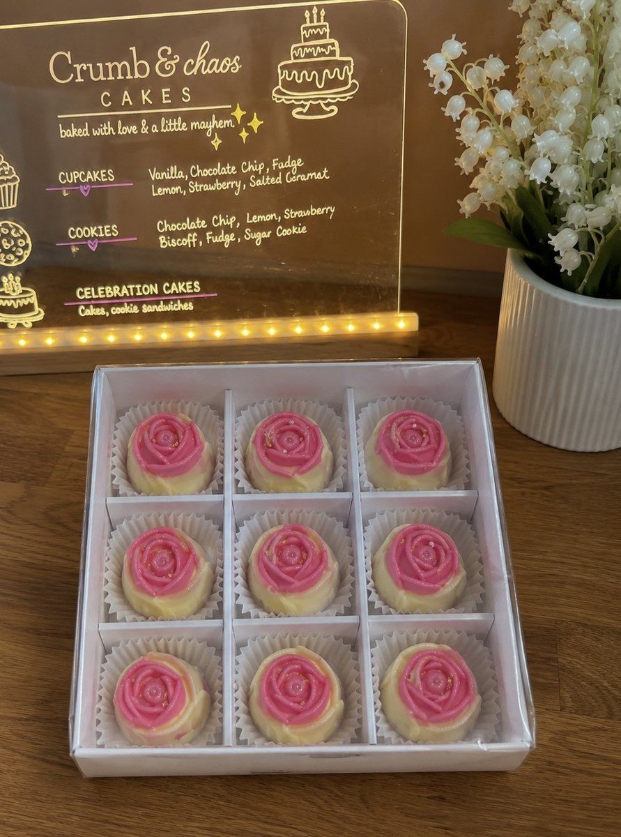 Box of nine pink rose-topped handmade chocolates
