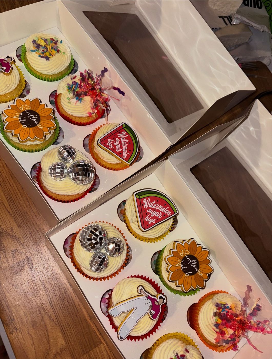 Cupcakes with disco ball, sunflower and watermelon sugar high edible toppers