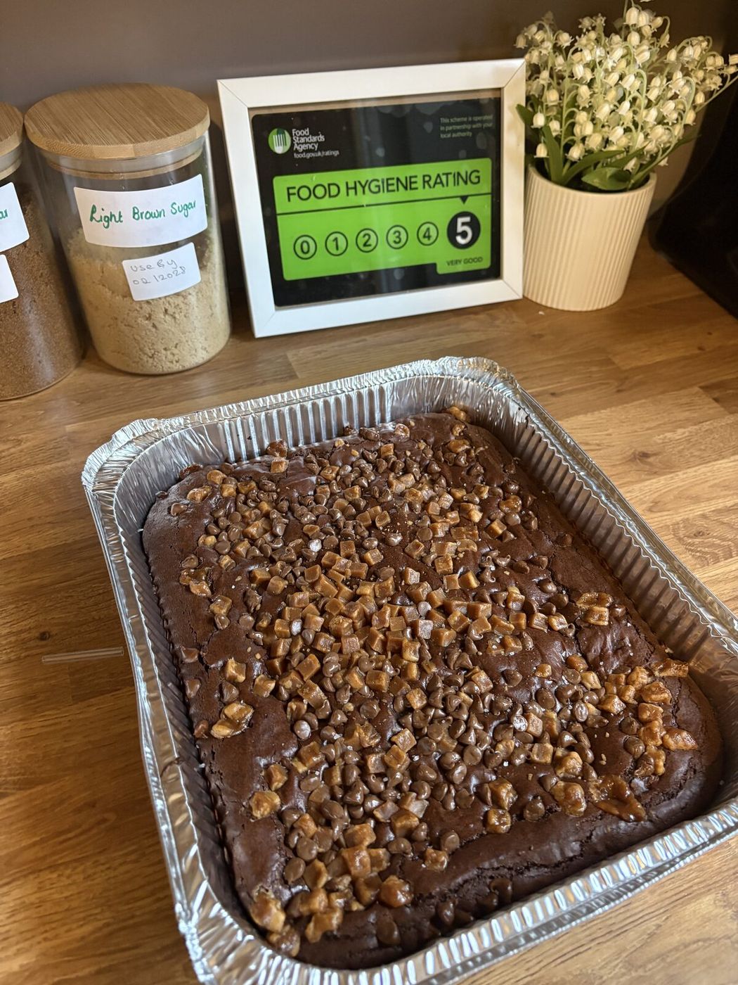 Toffee chip brownie traybake with caramel pieces and chocolate chips